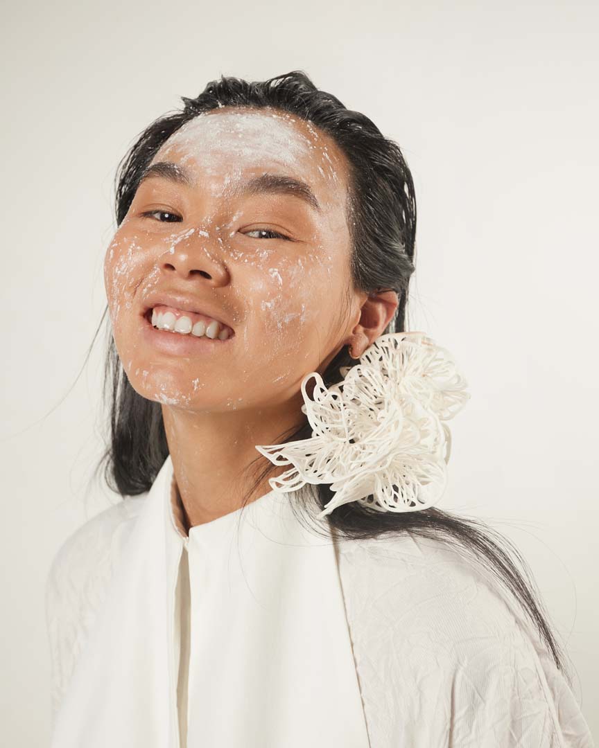 Transformer top: DZHUS Facial mask: White Mandarin 3D-printed earring: Lada Legina